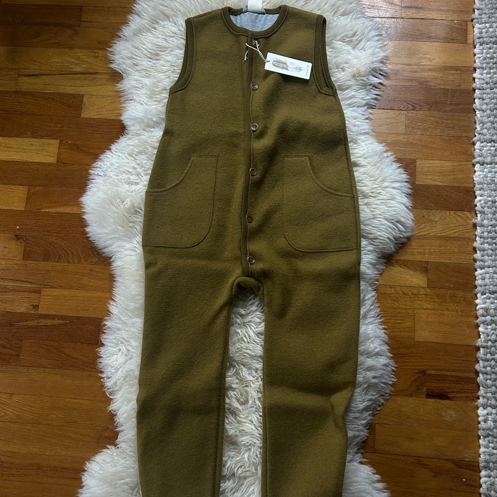NWT boiled wool play suit in gold from Mama Owl Siskin